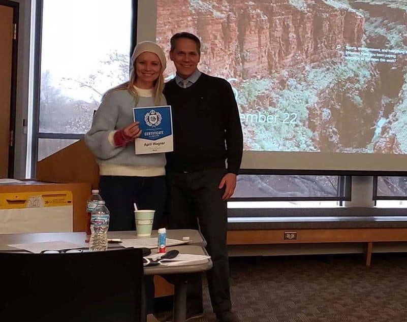 April receiving certificate for Business of Leadership course